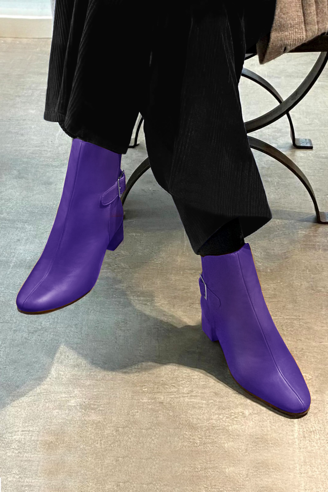 Violet purple women's ankle boots with buckles at the back. Round toe. Low block heels. Worn view - Florence KOOIJMAN